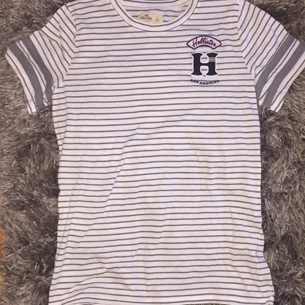 Two Hollister gray and white t-shirts.